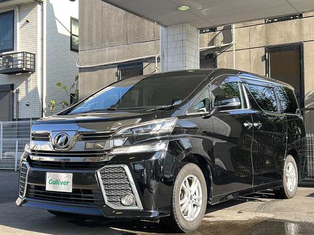 トヨタ ヴェルファイア Z 京都府 2016(平28)年 7.5万km ブラック 純正SDナビ/フルセグTV/Bluetooth Audio/CD/DVD/バックカメラ/両側パワースライドドア/レーダー探知機/AUTO SECURITY SYSTEM/2列目オットマン/ステアリングスイッチ/電動パーキングブレーキ/電格ウィンカーミラー/オートリトラクタブルミラー/プッシュスタート/オールオートパワーウィンドウ/純正フロアマット/純正/保証書/取扱説明書/ナビ取扱説明書