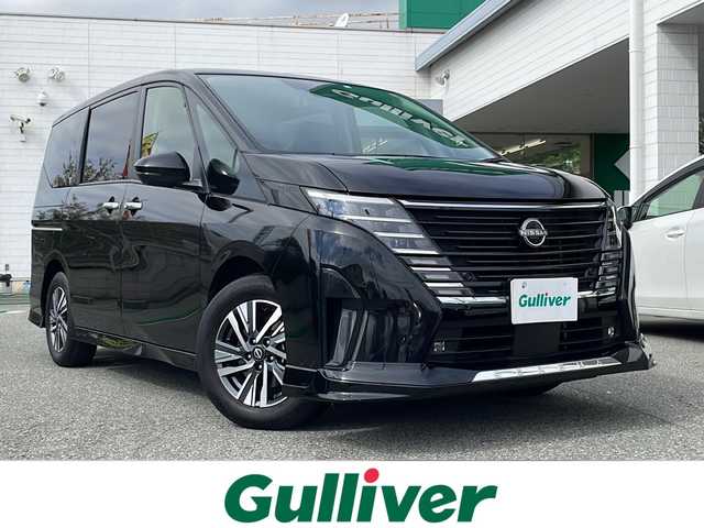 日産 セレナ e－パワー ハイウェイスター V 兵庫県 2023(令5)年 2.8万km ダイヤモンドブラック ワンオーナー/保証書・取説・有/純正メモリーナビ・フルセグ・BT・FM・AM・HDMI/バックカメラ/全周囲カメラ/ETC2.0/プロパイロット/追尾機能付きクルーズコントロール/車線逸脱防止支援システム/衝突被害軽減ブレーキ/クリアランスソナー/踏み間違え防止システム/パーキングブレーキサポート/ロードサインアシスト/ブラインドスポットミラー/両側パワースライドドア/ワイヤレス充電器/電動パーキングブレーキ/ブレーキホールド/革調シートカバー/プッシュスタート/スマートキー×2/純正フロアマット/純正アルミホイール/純正フロントスポイラー