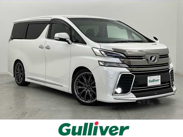 トヨタ ヴェルファイア Z Aエディション 福島県 2015(平27)年 6.8万km ホワイトパールクリスタルシャイン モデリスタエアロ（F/S)/純正10型ナビ（NSZT-ZA4T）/・フルセグTV/・BT.CD/DVD.SD/フリップダウンモニター（ALPINE）/クルーズコントロール/両側パワースライドドア/バックカメラ/ステアリングスイッチ/LEDヘッドライト/LEDフォグ/社外20インチAW/社外ミラー一体型ドラレコ/プッシュスタート/スマートキー