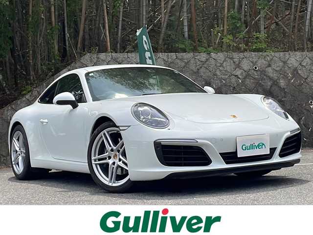 ポルシェ ９１１ カレラ 京都府 2019(平31)年 2.3万km 白 純正ナビ/スポーツクロノパッケージ/シートヒーター/パワーシート/オートライト/LEDヘッドライト/オートエアコン/横滑り防止措置/コーナーセンサー/バックカメラ/パドルシフト/アイドリングストップ/ETC2.0/純正フロアマット/ドライブレコーダー/電動パーキングブレーキ/純正19インチAW