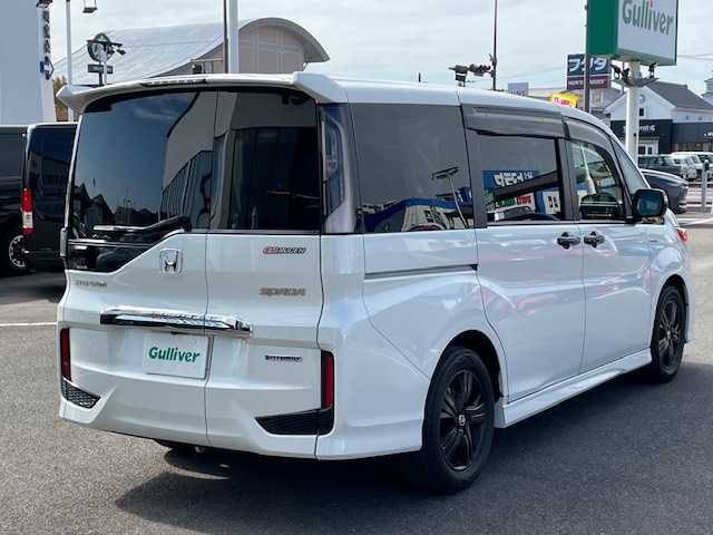 ホンダ ステップワゴン スパーダ ハイブリッドG EX HセンシングBスタイ 長崎県 2019(令1)年 5.2万km プラチナホワイトパール 純正9インチメモリナビ/CD/DVD/BT/USB/HDMI/フルセグTV/バックカメラ/ホンダセンシング/レーダークルーズコントロール/レーンキープアシスト/両側パワースライドドア/ハーフレザーシート/前席シートヒーター/シーケンシャルウィンカー/ビルトインETC