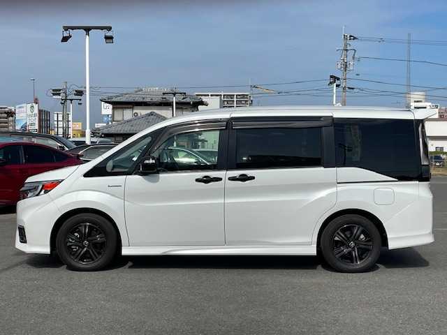 ホンダ ステップワゴン スパーダ ハイブリッドG EX HセンシングBスタイ 長崎県 2019(令1)年 5.2万km プラチナホワイトパール 純正9インチメモリナビ/CD/DVD/BT/USB/HDMI/フルセグTV/バックカメラ/ホンダセンシング/レーダークルーズコントロール/レーンキープアシスト/両側パワースライドドア/ハーフレザーシート/前席シートヒーター/シーケンシャルウィンカー/ビルトインETC