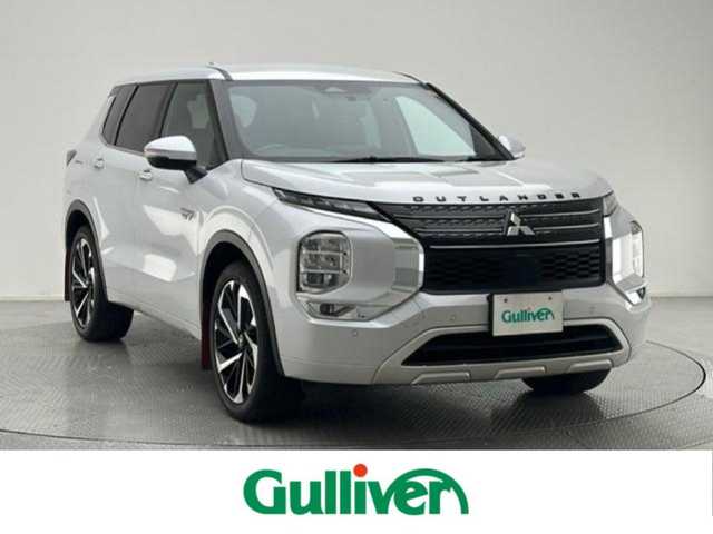 三菱 アウトランダー ＰＨＥＶ P 兵庫県 2022(令4)年 3.6万km ホワイトダイヤモンド 外部検査実施済み/ワンオーナー/４WD/Apple car play/純正メモリナビ/(フルセグTV/Bluetooth/USB)/BOSEサウンドシステム/アラウンドビューモニター/eアシスト/・衝突被害軽減ブレーキシステム/・踏み間違い衝突防止アシスト/・車線逸脱警報システム/・ふらつき警報/・標識認識システム/・後側方衝突被害防止支援システム/・後側方車両検知警報システム/・後退時車両検知警報システム/・車線逸脱防止支援機能/・前方衝突予測警報/デジタルインナーミラー/パワーバックドア/レーダークルーズコントロール/ブラインドスポットモニター/LEDヘッドライト/スマートキー/ビルトインETC2.0/前後ドライブレコーダー/黒レザーシート/前席パワーシート/全席シートヒーター/ヘッドアップディスプレイ/置くだけ充電/100V電源/パドルシフト/横滑り防止機能/純正20インチアルミホイール/カーテンエアバック/保証書/取扱説明書/スペアキー/充電ケーブル後送