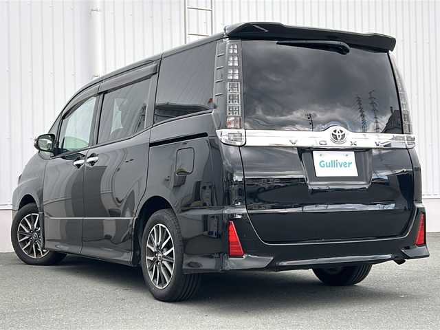 トヨタ ヴォクシー ZS 煌Ⅱ 三重県 2016(平28)年 9.2万km ブラック 純正9型ナビ　/純正12.1型後席モニター　/バックカメラ　/ビルトインETC2.0　/両側パワースライドドア　/前方ドライブレコーダー　/レーンキープアシスト　/衝突軽減ブレーキ/アイドリングストップ/純正フロアマット　/オートハイビーム /オートライト/革巻きステアリング/ステアリングスイッチ/電動格納ミラー/禁煙車