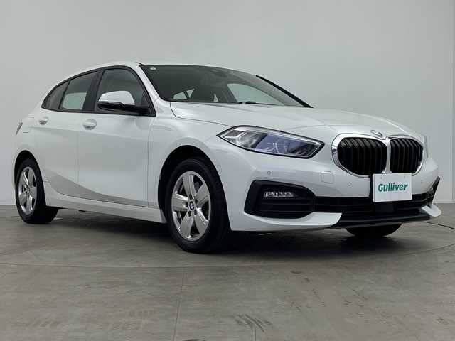 ＢＭＷ １１８ｄ プレイ エディションジョイ+ 鹿児島県 2021(令3)年 2万km 白 禁煙者/純正ナビゲーションシステム/Bluetooth/ワイヤレス充電/シートメモリー/クルーズコントロール/オートハイビーム/ETC/運転席パワーシート/パーキングアシスト/ブラインドスポットモニター/電動格納ミラー/CarPlay