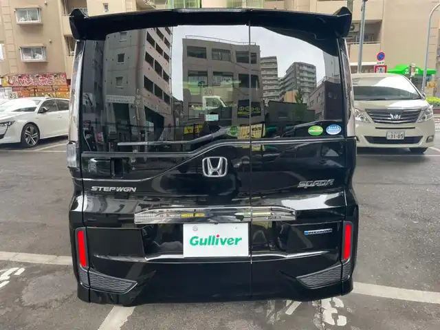 ホンダ ステップワゴン スパーダ eHEV G ホンダS 大阪府 2020(令2)年 5.8万km プレミアムスパークルブラックパール Gathers純正メモリナビ（CD/DVD/BT/SD）/Gathers純正フリップダウンモニター/フルセグテレビ/衝突軽減ブレーキ/ホンダセンシング/レーダークルーズコントロール/純正18インチアルミホイール/バックカメラ/LEDヘッドランプ/新車保証書/取扱説明書/ビルトインETC/ワンオーナー