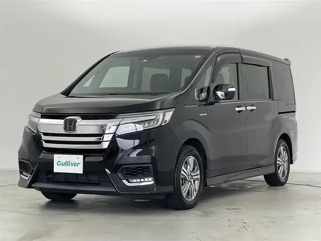 ホンダ ステップワゴン スパーダ eHEV G ホンダS 群馬県 2020(令2)年 5.8万km プレミアムスパークルブラックパール ホンダセンシング　/　・衝突軽減ブレーキ/　・誤発進抑制機能/　・歩行者事故低減ステアリング/　・アダプティブクルーズコントロール/　・先行車発進お知らせ機能/　・標識認識機能/前後ドライブレコーダー/バックカメラ/ナビ装着用スペシャルパッケージ+ETC車載器/　・純正9インチメモリナビ【型番　VXM-197VFNi】/　・ビルトインETC/純正フロアマット/純正16インチアルミホイール/アルミホイール付スタッドレスタイヤ/オートLEDヘッドライト/スマートキー