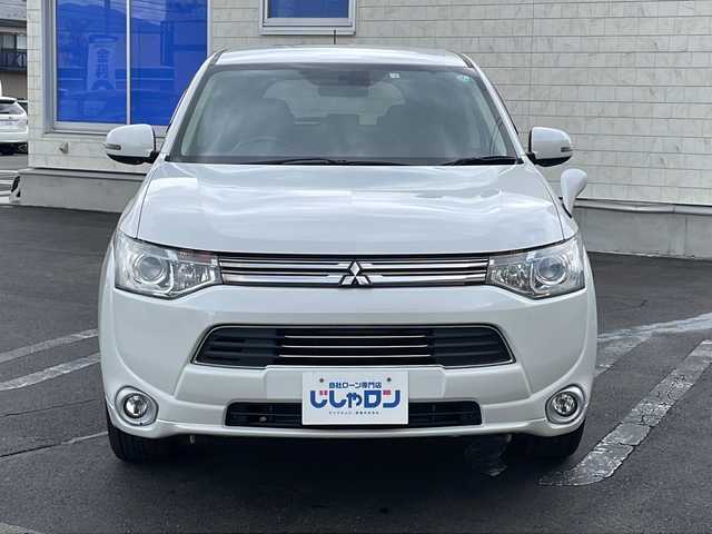 三菱 アウトランダー ＰＨＥＶ G セーフティパッケージ 長野県 2014(平26)年 6.6万km シルキーホワイト (株)IDOMが運営する【じしゃロン長野店】の自社ローン専用車両になります/こちらは現金またはオートローンご利用時の価格です。自社ローンご希望の方は別途その旨お申付け下さい./社外ナビ（CD/DVD/BT）/バックカメラ/HIDヘットライト/４WD/ステアリングスイッチ/クルーズコントロール/パドルシフト