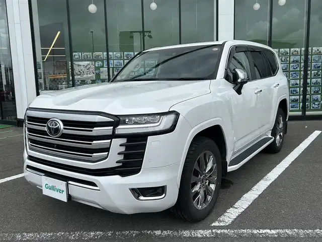 トヨタ ランドクルーザー ZX 長崎県 2023(令5)年 1.7万km プレシャスホワイトパール 純正ナビ（BT/CD/AM/FM)/フルセグTV/全方位カメラ/USB入力端子/100V充電/ETC2.0/パワーシート/電動リアゲート/電動格納サードシート/レザーシート/クルーズコントロール/コーナーセンサー/ウィンカーミラー/スペアキー/ワンオーナー
