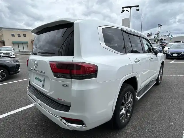 トヨタ ランドクルーザー ZX 長崎県 2023(令5)年 1.7万km プレシャスホワイトパール 純正ナビ（BT/CD/AM/FM)/フルセグTV/全方位カメラ/USB入力端子/100V充電/ETC2.0/パワーシート/電動リアゲート/電動格納サードシート/レザーシート/クルーズコントロール/コーナーセンサー/ウィンカーミラー/スペアキー/ワンオーナー