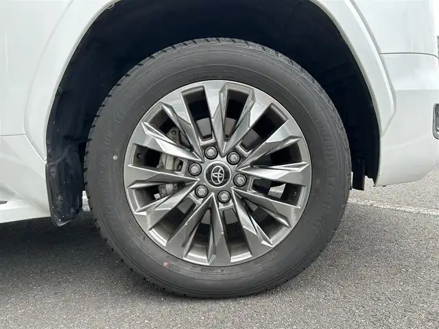 トヨタ ランドクルーザー ZX 長崎県 2023(令5)年 1.7万km プレシャスホワイトパール 純正ナビ（BT/CD/AM/FM)/フルセグTV/全方位カメラ/USB入力端子/100V充電/ETC2.0/パワーシート/電動リアゲート/電動格納サードシート/レザーシート/クルーズコントロール/コーナーセンサー/ウィンカーミラー/スペアキー/ワンオーナー