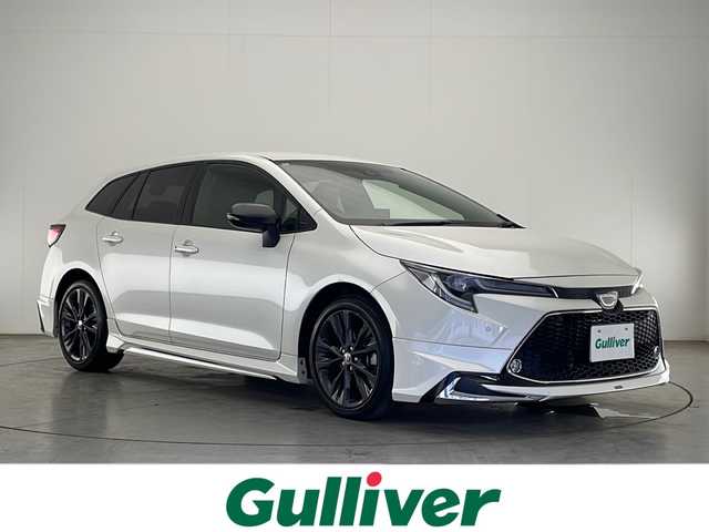 トヨタ カローラツーリング ダブルバイビー 宮崎県 2020(令2)年 3.4万km ホワイトパールクリスタルシャイン ワンオーナー/モデリスタフルエアロ/Toyota Safety Sense/〇プリクラシュセーフティ/〇レーントレーシングアシスト/〇パーキングサポートブレーキ/〇ロードサインアシスト/〇クリアランスソナー/〇レーダークルーズコントロール/〇オートマチックハイビーム/〇先行車発進告知/純正9インチナビ/バックカメラ/ハーフレザーシート/シートヒーター/LEDヘッドライト/ビルトインETC/純正17インチAW/保証書/取扱説明書