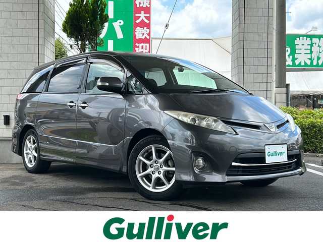 トヨタ エスティマ アエラス Gエディション 東京都 2010(平22)年 7.6万km グレーメタリック 純正ナビ【Bluetooth接続可、CD、DVD、フルセグTV】/バックカメラ/後席モニター/両側パワースライドドア/クルーズコントロール/ドライブレコーダー前後/純正アルミホイール/社外フロアマット/ウォークスルー/三列シート/ETC/MTモード付AT/オートライト/盗難防止装置/ABS/WAC/Wエアバッグ/スマートキー/スペアキー1本/保証書、取扱説明書