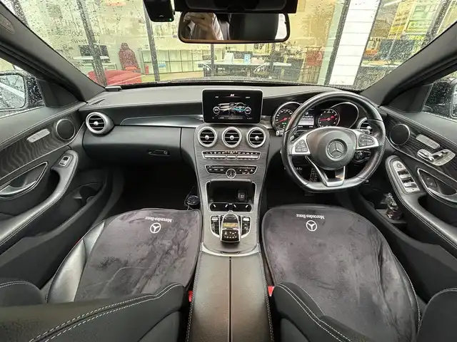 メルセデス・ベンツ Ｃ１８０ アバンギャルド AMGライン 愛媛県 2014(平26)年 6.8万km オブシディアンブラック パナメリカーナグリル/ＢＲＡＢＵＳフロントリップ/Ｃａｒｌｓｓｏｎ２０インチＡＷ/アテンションアシスト/レーンキープ/純正ナビ/フルセグTV/Bluetooth/バックカメラ/ハーフレザーシート/パワーシート/シートヒーター/ＢＳＭ/パドルシフト/オレンジキャリパーカバー/ステアリングアシスト/革巻きステアリング/パドルシフト/電動格納ミラー/オートライト/LEDヘッドライト/前方ドライブレコーダー/プッシュスタート