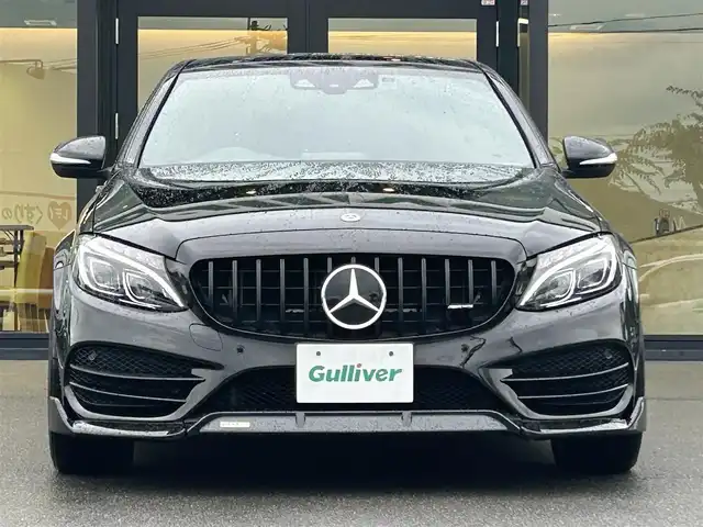 メルセデス・ベンツ Ｃ１８０ アバンギャルド AMGライン 愛媛県 2014(平26)年 6.8万km オブシディアンブラック パナメリカーナグリル/ＢＲＡＢＵＳフロントリップ/Ｃａｒｌｓｓｏｎ２０インチＡＷ/アテンションアシスト/レーンキープ/純正ナビ/フルセグTV/Bluetooth/バックカメラ/ハーフレザーシート/パワーシート/シートヒーター/ＢＳＭ/パドルシフト/オレンジキャリパーカバー/ステアリングアシスト/革巻きステアリング/パドルシフト/電動格納ミラー/オートライト/LEDヘッドライト/前方ドライブレコーダー/プッシュスタート