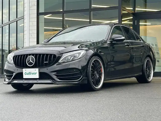 メルセデス・ベンツ Ｃ１８０ アバンギャルド AMGライン 愛媛県 2014(平26)年 6.8万km オブシディアンブラック パナメリカーナグリル/ＢＲＡＢＵＳフロントリップ/Ｃａｒｌｓｓｏｎ２０インチＡＷ/アテンションアシスト/レーンキープ/純正ナビ/フルセグTV/Bluetooth/バックカメラ/ハーフレザーシート/パワーシート/シートヒーター/ＢＳＭ/パドルシフト/オレンジキャリパーカバー/ステアリングアシスト/革巻きステアリング/パドルシフト/電動格納ミラー/オートライト/LEDヘッドライト/前方ドライブレコーダー/プッシュスタート