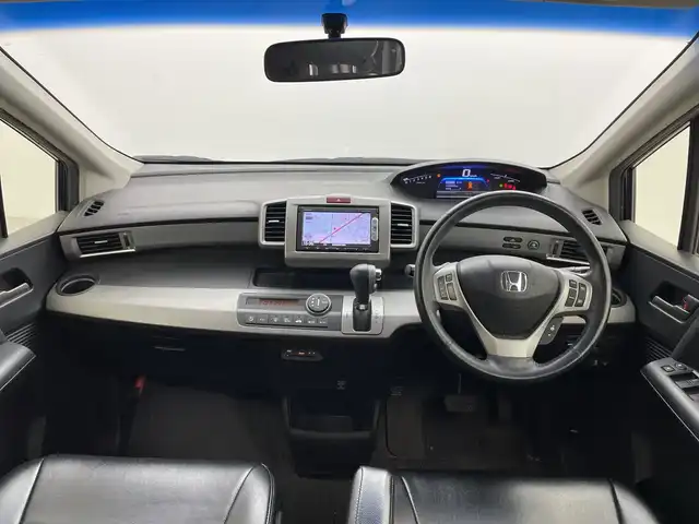 ホンダ フリード ハイブリット ジャストセレクション 群馬県 2015(平27)年 7万km プレミアムスパークルブラックパール 純正ナビ　ワンセグＴＶ　バックカメラ　クルーズコントロール　オートライト　ＨＩＤヘッドライト　両側電動スライドドア　電動格納ミラー　ウィンカーミラー　革巻きステアリング　ＥＴＣ　スマートキー　禁煙車