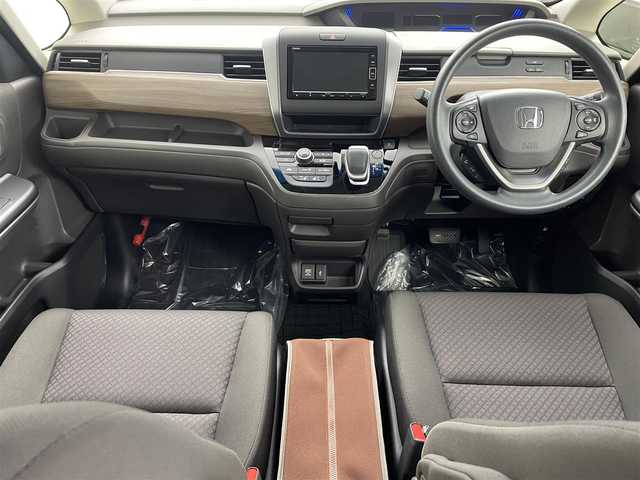 ホンダ フリード ハイブリット G ホンダセンシング 埼玉県 2020(令2)年 0.8万km プラチナホワイトパール 純正ナビ　Ｂカメラ　温シート　追従走行　ＥＴＣ　両側パワースライドドア　コーナーセンサー　衝突軽減システム　レーンキープアシスト　スペアキー　前後ドライブレコーダー　禁煙車　スマートキー