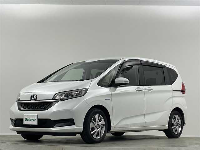 ホンダ フリード ハイブリット G ホンダセンシング 埼玉県 2020(令2)年 0.8万km プラチナホワイトパール 純正ナビ　Ｂカメラ　温シート　追従走行　ＥＴＣ　両側パワースライドドア　コーナーセンサー　衝突軽減システム　レーンキープアシスト　スペアキー　前後ドライブレコーダー　禁煙車　スマートキー
