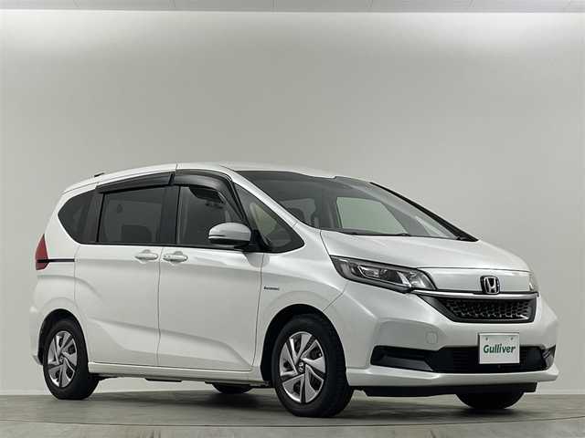 ホンダ フリード ハイブリット G ホンダセンシング 埼玉県 2020(令2)年 0.8万km プラチナホワイトパール 純正ナビ　Ｂカメラ　温シート　追従走行　ＥＴＣ　両側パワースライドドア　コーナーセンサー　衝突軽減システム　レーンキープアシスト　スペアキー　前後ドライブレコーダー　禁煙車　スマートキー