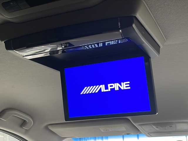 日産 エルグランド 250HWS アーバンクロム 愛知県 2013(平25)年 9.2万km ブリリアントホワイトパール /ALPINEナビ/フルセグ/CD/DVD/SD/MSV//バックカメラ/ETC//フリップダウンモニター//両側パワースライドドア//HKS車高調HIPERMAX//WORK20インチAW//ウッドコンビステアリング//ハーフレザーシート//2列目・N席オットマン付きシート//オートライト/フォグ//純正AW積載//新車時保証書//取扱説明書//スペアスマートキー有