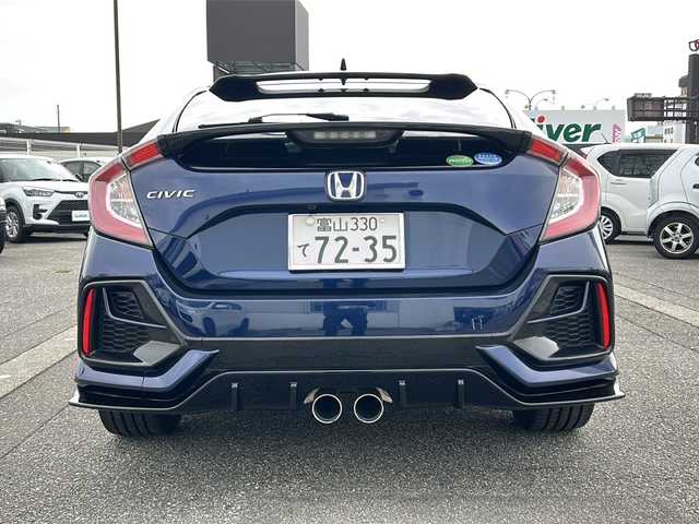 ホンダ シビック ハッチバック 富山県 2020(令2)年 1.3万km オブシダンブルーパール ワンオーナー/純正メモリーナビ(VXM-214VFi)/フルセグテレビ/Bluetooth/バックカメラ/ドライブレコーダー（前後）/ビルトインETC2.0/アイドリングストップ/電動格納ウィンカーミラー/ACC/プッシュスタート/オートライト/パワーシート（D/N）/レーンキープアシスト/横滑り防止/衝突軽減/シートヒーター（D/N）/無限エアロ/保証書・取説・ナビ取説/スマートキー（スマートキー）