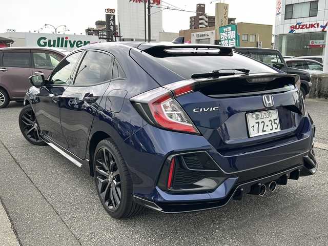 ホンダ シビック ハッチバック 富山県 2020(令2)年 1.3万km オブシダンブルーパール ワンオーナー/純正メモリーナビ(VXM-214VFi)/フルセグテレビ/Bluetooth/バックカメラ/ドライブレコーダー（前後）/ビルトインETC2.0/アイドリングストップ/電動格納ウィンカーミラー/ACC/プッシュスタート/オートライト/パワーシート（D/N）/レーンキープアシスト/横滑り防止/衝突軽減/シートヒーター（D/N）/無限エアロ/保証書・取説・ナビ取説/スマートキー（スマートキー）