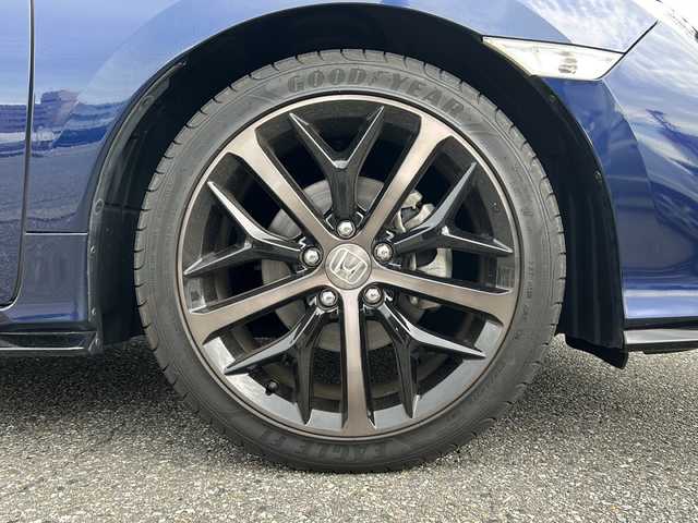 ホンダ シビック ハッチバック 富山県 2020(令2)年 1.3万km オブシダンブルーパール ワンオーナー/純正メモリーナビ(VXM-214VFi)/フルセグテレビ/Bluetooth/バックカメラ/ドライブレコーダー（前後）/ビルトインETC2.0/アイドリングストップ/電動格納ウィンカーミラー/ACC/プッシュスタート/オートライト/パワーシート（D/N）/レーンキープアシスト/横滑り防止/衝突軽減/シートヒーター（D/N）/無限エアロ/保証書・取説・ナビ取説/スマートキー（スマートキー）