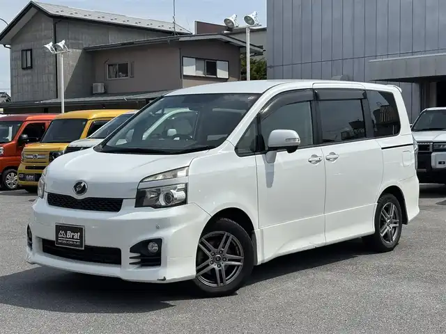 トヨタ ヴォクシー ZS 栃木県 2010(平22)年 11.7万km ホワイトパールクリスタルシャイン 純正ナビ(CD/DVD再生)/前後ドライブレコーダー/ETC/バックカメラ/コーナーセンサー/パドルシフト/オートライト/オールオートウィンドウ/片側パワースライドドア/リアクーラー/ステアリングスイッチ/純正フロアマット/スマートキー