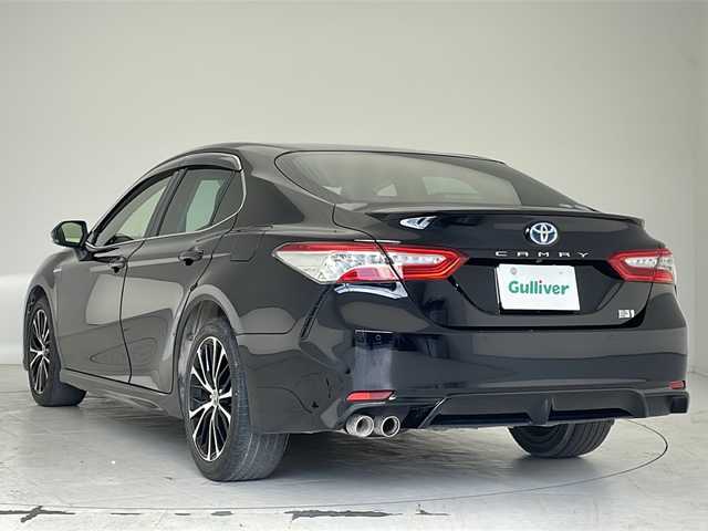 トヨタ カムリ WSレザーパッケージ 沖縄県 2019(平31)年 2.1万km アティチュードブラックマイカ 純正８型ディスプレイオーディオ　/　(フルセグTV　Bluetooth　CD　DVD)/バックカメラ　/ETC/トヨタセーフティセンス　/・衝突被害軽減ブレーキ (プリクラッシュセーフティ)																									/・ハンドル操作サポート (レーントレーシングアシスト)																									/・追従ドライブ支援機能 (レーダークルーズコントロール)																									/・車線はみ出しアラート (レーンディパーチャーアラート)																									/・自動ハイビーム (オートマチックハイビーム)																									/パワーシート　/シートヒーター/レザーシート　/ＬＥＤヘッドライト　/オートライト/クリアランスソナー/純正フロアマット/純正１８インチアルミホイール/スマートキー/プッシュスタート