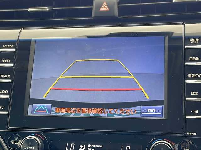 トヨタ カムリ WSレザーパッケージ 沖縄県 2019(平31)年 2.1万km アティチュードブラックマイカ 純正８型ディスプレイオーディオ　/　(フルセグTV　Bluetooth　CD　DVD)/バックカメラ　/ETC/トヨタセーフティセンス　/・衝突被害軽減ブレーキ (プリクラッシュセーフティ)																									/・ハンドル操作サポート (レーントレーシングアシスト)																									/・追従ドライブ支援機能 (レーダークルーズコントロール)																									/・車線はみ出しアラート (レーンディパーチャーアラート)																									/・自動ハイビーム (オートマチックハイビーム)																									/パワーシート　/シートヒーター/レザーシート　/ＬＥＤヘッドライト　/オートライト/クリアランスソナー/純正フロアマット/純正１８インチアルミホイール/スマートキー/プッシュスタート