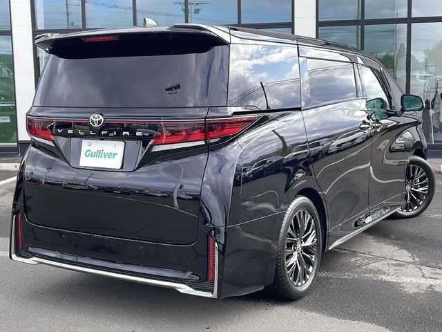 トヨタ ヴェルファイア Z プレミア 道東・釧路十勝 2023(令5)年 3.7万km ブラック ・４WD/・純正14インチディスプレイオーディオ/(BT/USB/FM/AM/AppleCarPlay)/・純正フリップダウンモニター/・全方位カメラ/バックカメラ/・ガラスルーフ/・プリクラッシュセーフティ/・アドバンストドライブ/・ロードサインアシスト/・フロントクロストラフィックアラート/・レーンディパーチャーアラート/・レーンチェンジアシスト/・プロアクティブドライビングアシスト/・リアクロストラフィックアラート/・ブラインドスポットモニター/・後方車両接近告知/・パーキング/・リアカメラディテクション/・安心降車アシスト/・周辺車両接近時サポート/・アドバンスドパーク/・クリアランスソナー/・置くだけ充電/・横滑り防止/・AC100V/100w/・前席・2列目パワーシート/・前席・2列目シートヒーター・エアーシート/・両側パワースライドドア/・パワーバックドア/・LEDヘッドライト/・フォグライト/・オートマチックハイビーム/・純正エンジンスターター/・オートステップ/・ミラーヒーター/・ステアリングスイッチ/・本革巻きステアリング/・前後ドライブレコーダー/・デジタルインナーミラー/・電格ウィンカーミラー