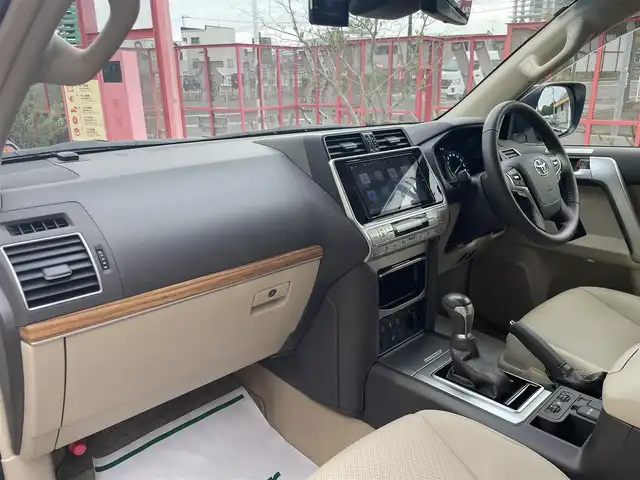 トヨタ ランドクルーザー プラド TX Lパッケージ 香川県 2023(令5)年 0.9万km ホワイトパールクリスタルシャイン 純正ナビ/【Bluetooth/DVD/CD】/フルセグテレビ/バックカメラ/シートヒーター/エアシート/パワーシート/プッシュスタート/オートマチックハイビーム/ETC/純正フロアマット