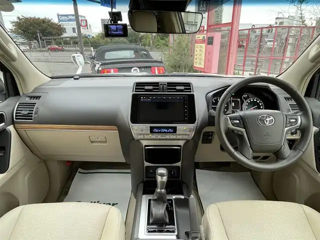 トヨタ ランドクルーザー プラド TX Lパッケージ 香川県 2023(令5)年 0.9万km ホワイトパールクリスタルシャイン 純正ナビ/【Bluetooth/DVD/CD】/フルセグテレビ/バックカメラ/シートヒーター/エアシート/パワーシート/プッシュスタート/オートマチックハイビーム/ETC/純正フロアマット