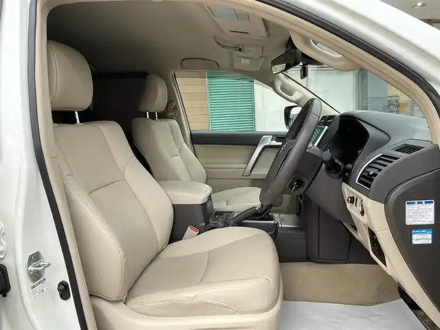 トヨタ ランドクルーザー プラド TX Lパッケージ 香川県 2023(令5)年 0.9万km ホワイトパールクリスタルシャイン 純正ナビ/【Bluetooth/DVD/CD】/フルセグテレビ/バックカメラ/シートヒーター/エアシート/パワーシート/プッシュスタート/オートマチックハイビーム/ETC/純正フロアマット