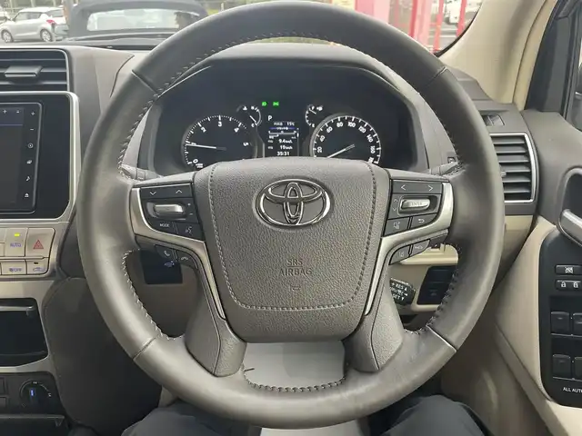 トヨタ ランドクルーザー プラド TX Lパッケージ 香川県 2023(令5)年 0.9万km ホワイトパールクリスタルシャイン 純正ナビ/【Bluetooth/DVD/CD】/フルセグテレビ/バックカメラ/シートヒーター/エアシート/パワーシート/プッシュスタート/オートマチックハイビーム/ETC/純正フロアマット