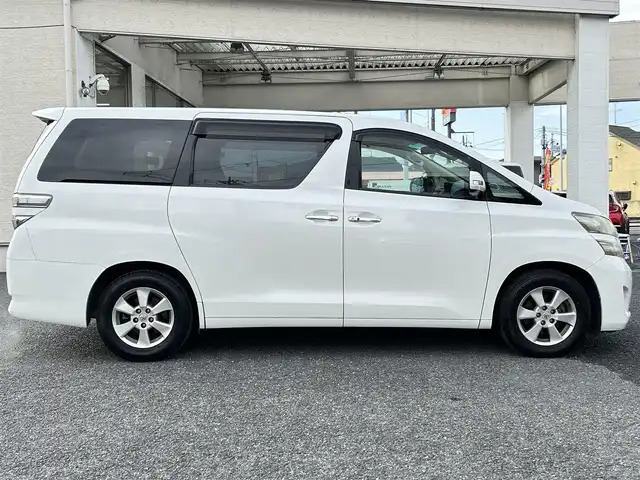 トヨタ ヴェルファイア 2．4X 埼玉県 2010(平22)年 8.3万km ホワイトパールクリスタルシャイン ・純正ナビ：フルセグテレビ/・バックカメラ/・ETC/・ステアリングリモコン/・プッシュスタート/・スマートキー/・オートライト/・横滑り防止/・パーキングセンサー/・コーナーセンサー/・HIDヘッドライト/・フォグランプ/・取扱説明書/・スペアキー１個