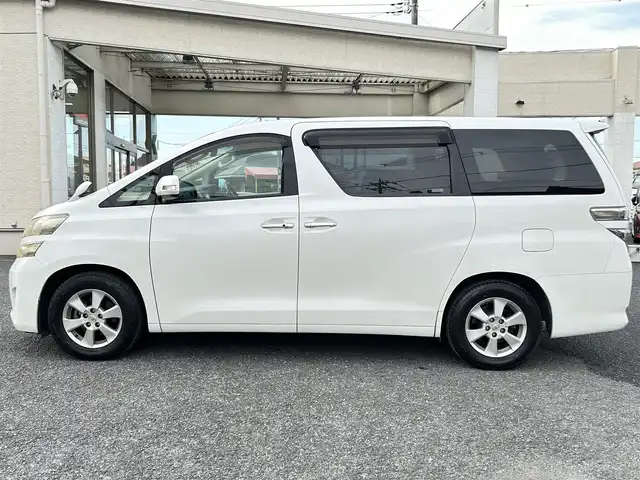 トヨタ ヴェルファイア 2．4X 埼玉県 2010(平22)年 8.3万km ホワイトパールクリスタルシャイン ・純正ナビ：フルセグテレビ/・バックカメラ/・ETC/・ステアリングリモコン/・プッシュスタート/・スマートキー/・オートライト/・横滑り防止/・パーキングセンサー/・コーナーセンサー/・HIDヘッドライト/・フォグランプ/・取扱説明書/・スペアキー１個