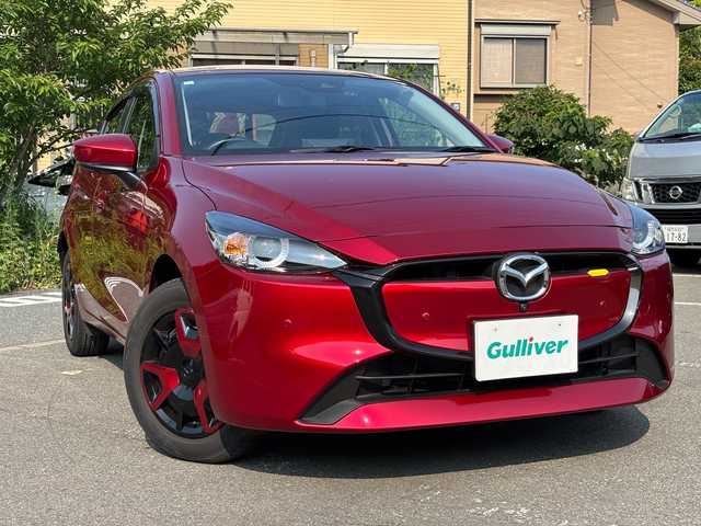 マツダ マツダ２ 15BD 福岡県 2023(令5)年 0.6万km ソウルレッドクリスタルM ワンオーナー/純正ナビ/（AM/FM/USB/Bluetooth/フルセグTV）/アラウンドビューモニター/横滑り防止/レーンキープ/衝突軽減ブレーキ/ブラインドスポットモニタリング/アイドリングストップ/ドライブレコーダー（前後）/パーキングアシスト/ハンズフリー/ビルドインETC/VIEWボタン/オートライト/電格ミラー/プッシュスタート/保証書/取扱説明書/スペアキー×１