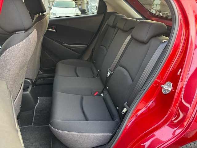 マツダ マツダ２ 15BD 福岡県 2023(令5)年 0.6万km ソウルレッドクリスタルM ワンオーナー/純正ナビ/（AM/FM/USB/Bluetooth/フルセグTV）/アラウンドビューモニター/横滑り防止/レーンキープ/衝突軽減ブレーキ/ブラインドスポットモニタリング/アイドリングストップ/ドライブレコーダー（前後）/パーキングアシスト/ハンズフリー/ビルドインETC/VIEWボタン/オートライト/電格ミラー/プッシュスタート/保証書/取扱説明書/スペアキー×１