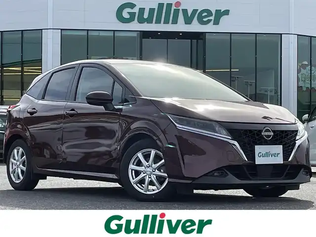 日産 ノート X 島根県 2021(令3)年 4.5万km バーガンディー 登録時走行距離44732km/保証書/取扱説明書/純正メーカーディスプレイオーディオ/アラウンドビューモニター/バックカメラ/フルセグTV/Applecarplay/デジタルインナーミラー/ドライブレコーダー/レーンキープアシスト/衝突被害軽減ブレーキ/横滑り防止装置/インテリジェンスクルーズコントロール/前後コーナーセンサー/プッシュスタート/電動格納式ドアミラー/オートライト/オートマチックハイビーム/ＬＥＤヘッドライト/スペアキー/ＥＴＣ2.0/純正15インチアルミ