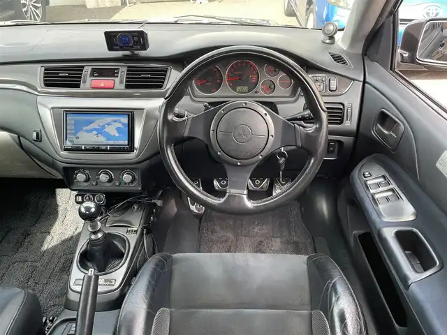 三菱 ランサー GSR エボリューションⅨ 大分県 2005(平17)年 18.9万km アメジストブラック 4WDターボ/TEIN車高調 （FLEX Z）/レカロ製ハーフレザーシート/社外メモリナビ AVIC-RZ711/【フルセグ/DVD/BTオーディオ】/純正17インチアルミホイール/アクティブ・センター・ディファレンシャル/社外サブウーファー/社外シフトノブ/ETC/インタークーラーウォータースプレー/HIDヘッドライト/フォグランプ/ヘッドライトレベライザー/レザーステアリング/チルトステアリング/リアプライバシーガラス/フロアマット/電動格納ミラー/Wエアバッグ/ABS/キーレス/スペアキー/保証書/車両取説/ナビ取説