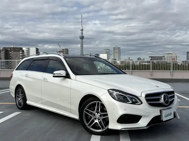 メルセデス・ベンツ Ｅ３５０ ブルーテックワゴンアバンギャルド 東京都 2015(平27)年 8.4万km ダイヤモンドホワイト サンルーフ/黒皮シート/純正ナビ（地デジTV/CD/BT)/バックカメラ・全方位カメラ/パワーバックドア/純正１８インチアルミ/シートヒーター/メモリーパワーシート/パドルシフト/トランクラゲッジカバー/クルーズコントロール/ETC/社外ドライブレコーダー（SD欠品）/スペアキー１本/保証書/取説
