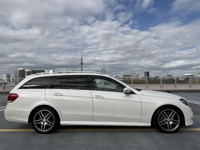 メルセデス・ベンツ Ｅ３５０ ブルーテックワゴンアバンギャルド 東京都 2015(平27)年 8.4万km ダイヤモンドホワイト サンルーフ/黒皮シート/純正ナビ（地デジTV/CD/BT)/バックカメラ・全方位カメラ/パワーバックドア/純正１８インチアルミ/シートヒーター/メモリーパワーシート/パドルシフト/トランクラゲッジカバー/クルーズコントロール/ETC/社外ドライブレコーダー（SD欠品）/スペアキー１本/保証書/取説
