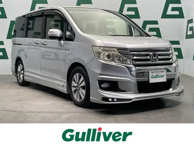 ホンダ ステップワゴン スパーダ Z 鹿児島県 2014(平26)年 7.1万km スーパープラチナメタリック 禁煙車　/純正9インチナビ/バックカメラ　/クルーズコントロール　/無限エアロ　/パドルシフト　/両側パワースライドドア　/ＥＴＣ　/フロアマット　/純正アルミホイール　/ドアバイザー/ＨＩＤヘッドライト　/フォグランプ　/電格ミラー