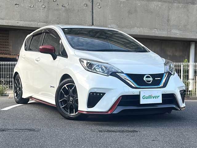 日産 ノート e－パワー ニスモ 愛知県 2018(平30)年 3.3万km ブリリアントホワイトパール ワンオーナー/社外SDナビ(AVIC-RZ091)/フルセグTV・CD・DVD・SD・Bluetooth・USB/インテリジェントエマージェンシーブレーキ/パーキングアシストシステム/車両接近通報システム/車線維持支援システム/ニスモシフトノブ/LEDヘッドライト/フォグライト/オートライト/ステアリングスイッチ/クリアランスソナー/純正16インチアルミホイール/室内灯LEDライト/ETC/スマートキー/プッシュスタート/純正ドアバイザー/純正フロアマット/電度格納ミラー/保証書/取扱説明書/スペアスマートキー