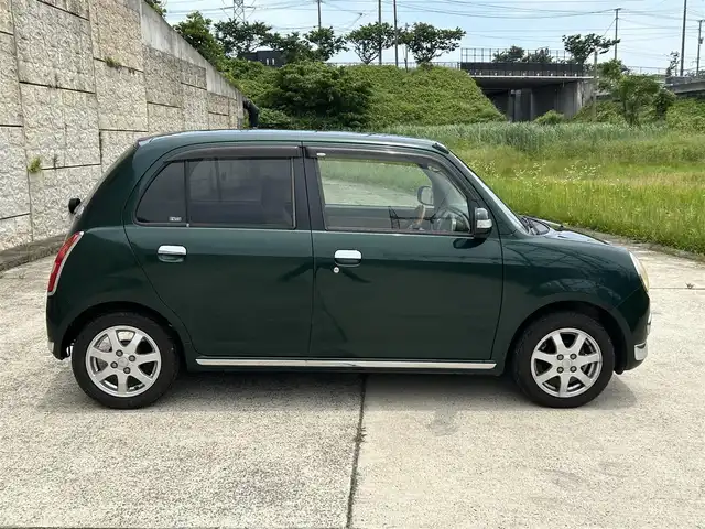 ダイハツ ミラ ジーノ プレミアムX 長崎県 2007(平19)年 17.9万km ブリティッシュグリーンマイカ 純正DVDナビ/（CD/DVD）/momoウッドコンビハンドル/ETC/リモコンキー/シートカバー/電動格納ミラー