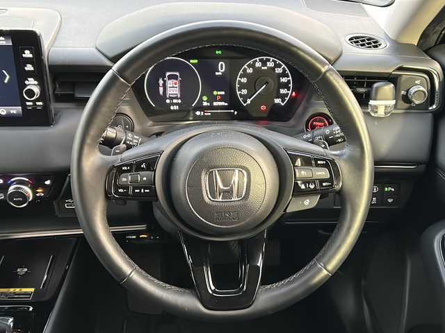 ホンダ ヴェゼル ハイブリッド e:HEV Z 茨城県 2023(令5)年 2.7万km クリスタルブラックパール ワンオーナー/ホンダコネクト純正9インチナビ/Bluetooth/AppleCarPlay/フルセグTV/マルチビューカメラ/バックカメラ/追従クルーズコントロール/電動リアゲート/USB端子/ワイヤレス充電器/ビルトインETC2.0/純正フロアマット/ステアリングヒーター/シートヒーター/ハーフレザー/LEDヘッドライト/オートライト/コーナーセンサー前後/レーンキープアシスト/スマートキー/保証書/取扱説明書/記録簿