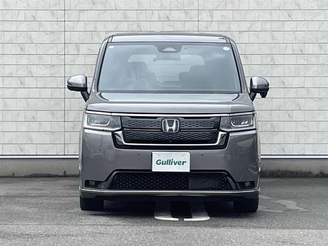 ホンダ ステップワゴン スパーダ eHEV 福岡県 2024(令6)年 0.8万km スーパープラチナグレーメタリック 純正11.4型SDナビ(フルセグTV/CD/DVD/BT)全方位モニターレーダークルコンホンダセンシングコーナーセンサー前後ドラレコBSM両側電動パワスラETCデジタルインナーミラーシートヒーターUSBポート電動リアゲート純正LEDヘッドライト純正16インチアルミホイール純正フロアマット