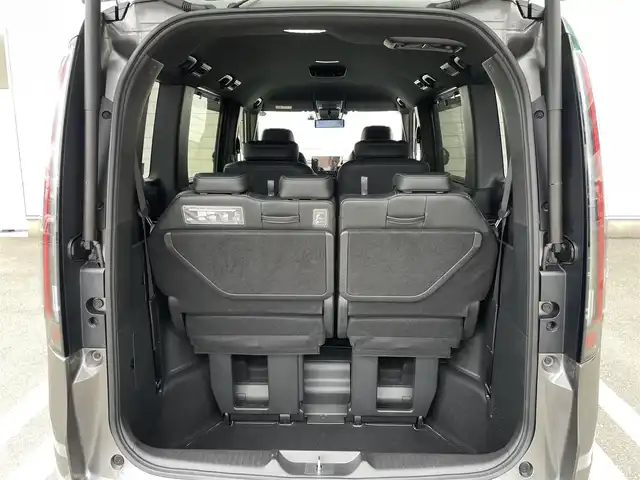 ホンダ ステップワゴン スパーダ eHEV 福岡県 2024(令6)年 0.8万km スーパープラチナグレーメタリック 純正11.4型SDナビ(フルセグTV/CD/DVD/BT)全方位モニターレーダークルコンホンダセンシングコーナーセンサー前後ドラレコBSM両側電動パワスラETCデジタルインナーミラーシートヒーターUSBポート電動リアゲート純正LEDヘッドライト純正16インチアルミホイール純正フロアマット